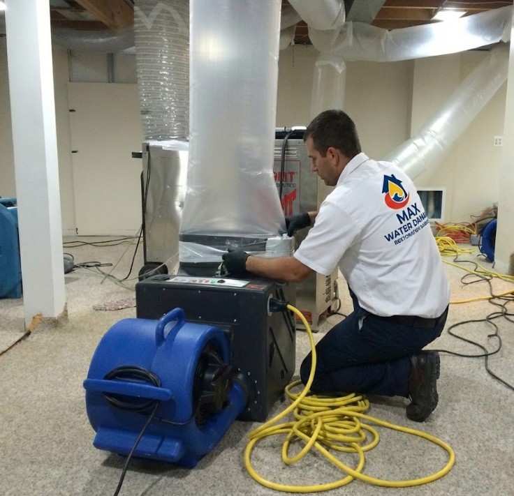 Professional water damage restoration work